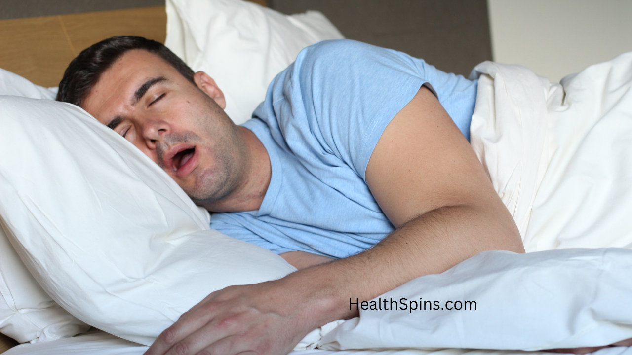 man in bed sleeping for sleep and cancer prevention